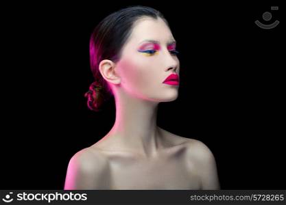 Girl with creative make up on black background