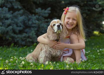 girl with dog looking at the camera