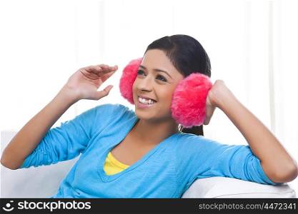 Girl with ear muffs