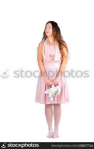 Girl with favorite toy over white background