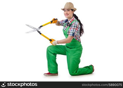 Girl with garden scissors on white