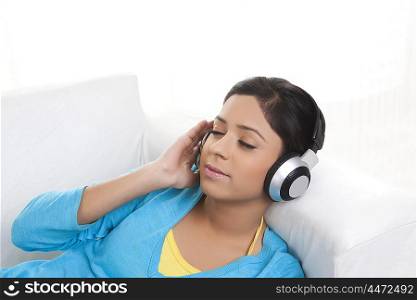 Girl with headphones listening to music