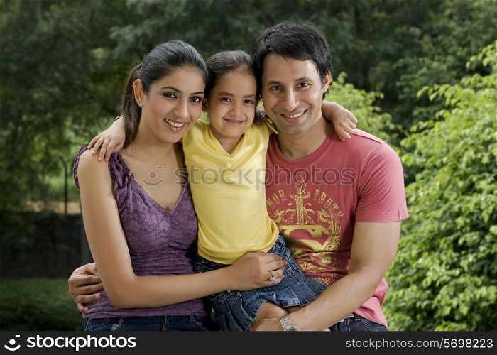 Girl with her parents