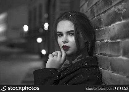 Girl with in the night city. Black and white photography.