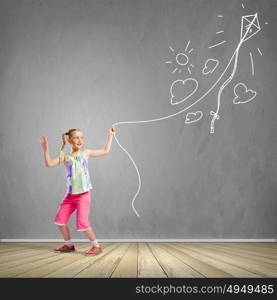 Girl with kite. Image of little girl playing with kite