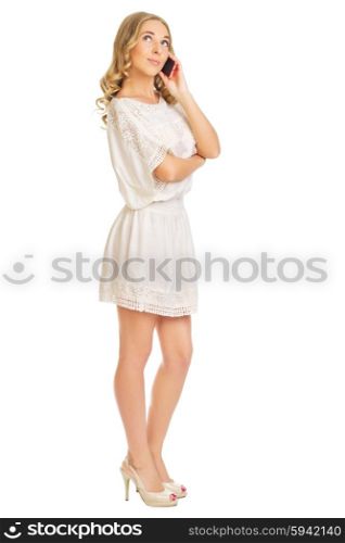 Girl with mobile phone isolated on white