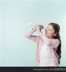girl with paper telescope