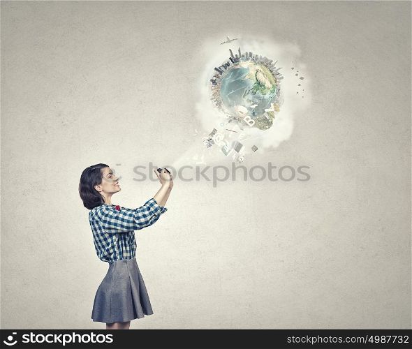 Girl with photo camera. Young beautiful woman taking photo with retro camera. Elements of this image are furnished by NASA