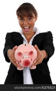 Girl with piggy bank