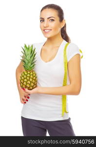 Girl with pineapple isolated on white