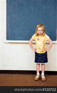 Girl with Sad Expression in Classroom