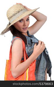 Girl with straw hat on white background