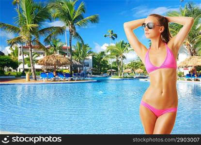 Girl with sunglasses at tropical swimming pool. Collage.