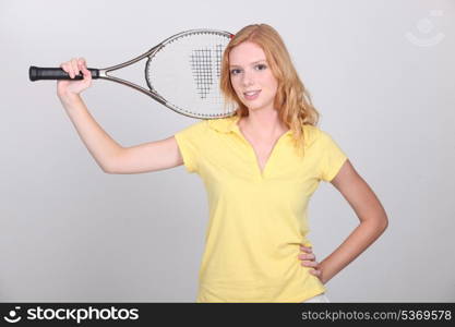 Girl with tennis racket