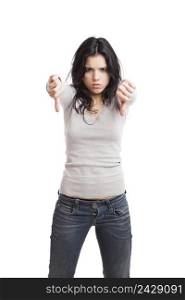 Girl with thumbs down, isolated against a white background
