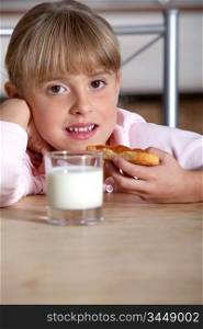 Girl with toast and milk