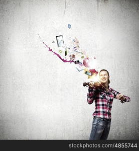 Girl with violin. Young pretty girl in casual playing violin