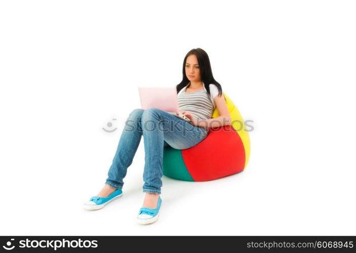 Girl working on laptop isolated on white