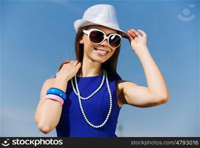 Girl young hat glasses. Attractive young girl in hat and glasses