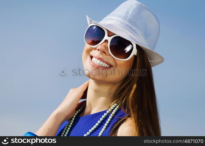 Girl young hat glasses. Attractive young girl in hat and glasses