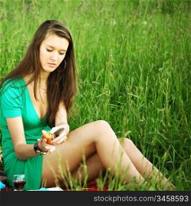 girlfriends on picnic in green grass