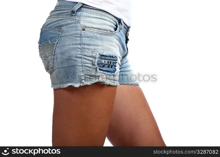 girls back in profile (jeans shorts) on white