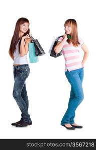 girls go home after shopping with completed packages on white background