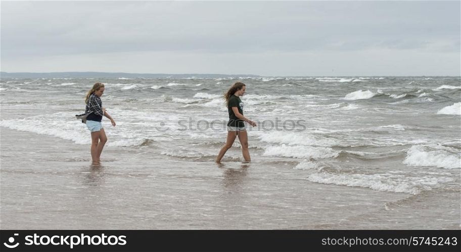 Girls on the beach, Prince Edward Island, Canada