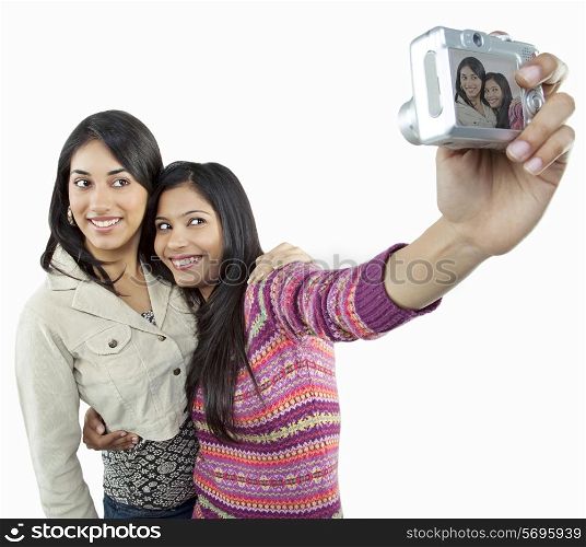 Girls taking a picture of themselves