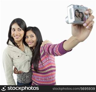 Girls taking a picture of themselves