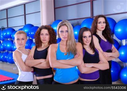 girls team in fitness center