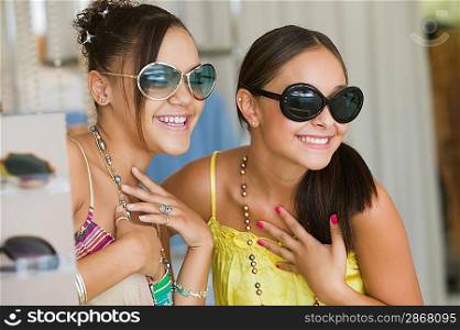 Girls Trying on Sunglasses