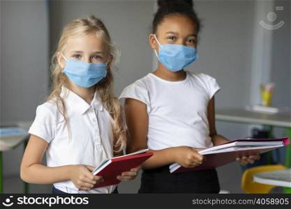 girls wearing medical masks class