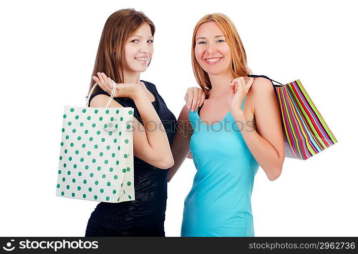 Girls with shopping bags on white