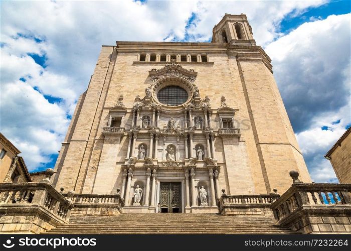 Girona cathedral facade with statues in a beautiful summer day, Catalonia, Spain