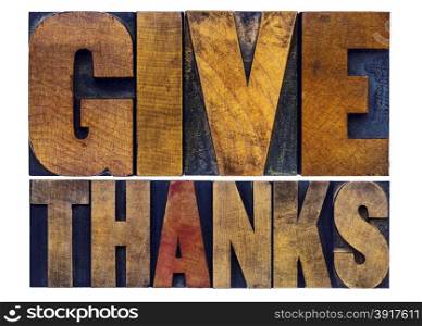 give thanks - Thanksgiving concept - isolated word abstract in letterpress wood type with ink patina