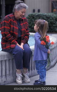 Giving Flowers to Grandma