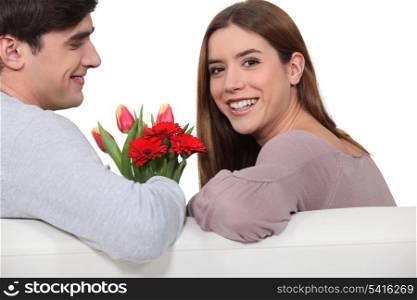 Giving flowers to his girlfriend