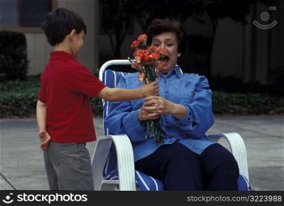 Giving Flowers to Mom