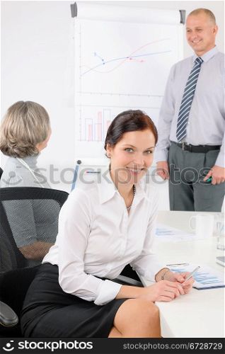 Giving presentation young executive during meeting woman review charts