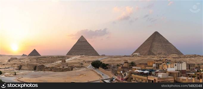 Giza live district in front of the Great Pyramids,Cairo, Egypt.