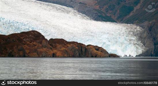 Glacier ice takes on a blue color unless glacial debris covers it
