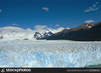 Glacier in a lake with mountains in the background, Moreno Glacier, Argentine Glaciers National Park, Lake Argentino, El Calafate, Patagonia, Argentina