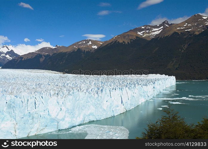 Glacier in a lake with mountains in the background, Moreno Glacier, Argentine Glaciers National Park, Lake Argentino, El Calafate, Patagonia, Argentina