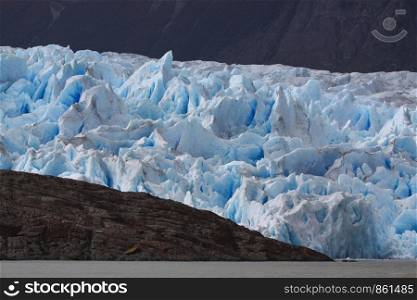 Glacier tongue in South America with icebergs