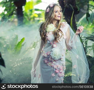 Glad blond lady with a wreath on the head