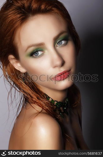 Glam. Refined Young Auburn Woman. Head and Shoulders Portrait