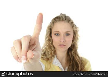 Glamorous blonde caucasian woman pointing a finger.