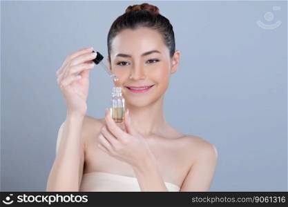 Glamorous portrait of beautiful woman applying extracted cannabis oil bottle for skincare product. CBD oil dropper pipette for cosmetology treatment and cannabinoids concept in isolated background.. Glamorous portrait of woman applying CBD oil skincare treatment.