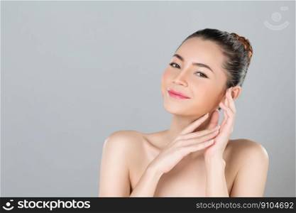 Glamorous woman portrait with perfect smooth pure clean skin with soft cosmetic makeup in isolated background. Beauty hand gesture with expressive facial expression for skincare product or spa ad.. Glamorous beautiful woman with perfect smooth and clean skin advertisement.